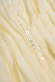 Celina Sculpted Yellow Peplum Top