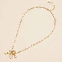 Gina Gold Dipped Bow Charm Necklace